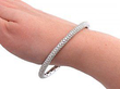 close up wearing Gold and Diamond Bangle