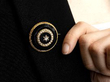 circular black onyx brooch with pearls