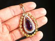 Amethyst and Diamond Yellow Gold Pendant In Hand