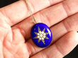 Enamel and Pearl Yellow Gold Locket In Hand