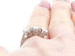 Classic Three Stone Ring Being Worn