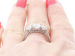 Round Brilliant Cut Diamond Trilogy Ring on finger