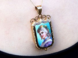 Antique Enamel Locket Being Worn
