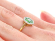 Garnet and Diamond Ring on finger