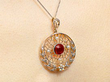 Antique Garnet and Diamond Pendant Being Worn