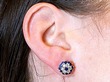 Sapphire and Diamond Earrings Being Worn
