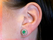 Vintage Emerald and Diamond Cluster Earrings Being Worn