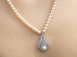 Pearl Strand Necklace with Pendant Wearing 