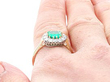 Emerald Cut Emerald Ring on the finger