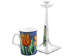 Weighted Sterling Silver Candlestick next to a mug