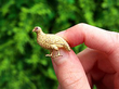 Gold bird brooch
