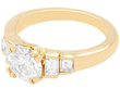 Round and Baguette Diamond Engagement Ring