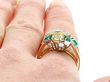 Emerald and Yellow Sapphire Ring Being Worn