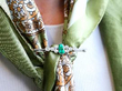 Wearing Emerald Brooch