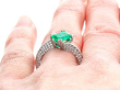 Vintage Emerald Ring with Diamond Band being worn