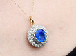 Wearing Yellow Gold Sapphire and Diamond Pendant