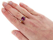Wearing Garnet Ring in Yellow Gold