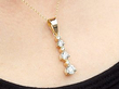 Close up 6 Stone Diamond Drop Pendant in Gold Worn