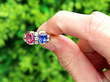Pink and Blue Sapphire Ring in Gold outside