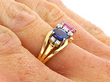 Pink and Blue Sapphire Ring in Gold on hand