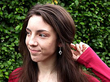 lozenge cut sapphire earrings with diamonds wearing