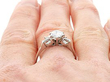 Round Solitaire with Baguettes in White Gold on the Hand