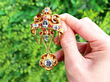 Gold Victorian Brooch with Gemstones