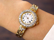 Ladies Yellow Gold Watch with Diamonds wearing