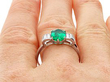 Oval Cut Emerald and Diamond Ring in Platinum on finger