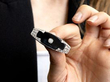 holding onyx brooch