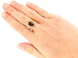 Wearing Garnet Ring in Yellow Gold