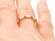 Ruby and Diamond Eternity Ring in Yellow Gold on Hand
