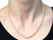 Pearl Strand Necklace with Green Sapphire Clasp wearing