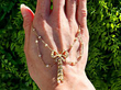 Bow Pearl Necklace in Yellow Gold outside