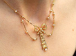 Bow Pearl Necklace in Yellow Gold Wearing