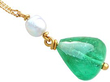 emerald and pearl pendant in gold