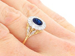 Round Sapphire Cluster Ring in Yellow Gold on finger