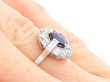 Oval Sapphire Cluster Ring with Baguette Side Stones being worn