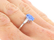 Blue Ceylon sapphire and platinum Engagement Ring on hand