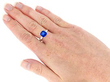 4 Carat Cushion Cut Sapphire Ring in White Gold wearing