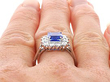 Octagonal Sapphire Ring with Diamonds on finger