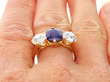 Victorian Sapphire Trilogy Engagement Ring in Gold on finger
