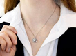 Diamond Halo Pendant Necklace in Platinum being worn