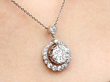 1920s Diamond Halo Pendant Necklace in Platinum being worn