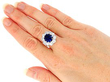 wearing Sapphire and Diamond Cluster Ring