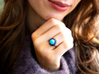 wearing turquoise and sapphire ring