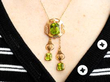 peridot necklace on neck