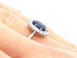 Oval Blue Sapphire Engagement Ring on Hand