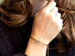 wearing Antique Sapphire Cluster Gold Bangle