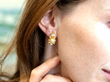 Gold Pearl and Diamond Earring being worn